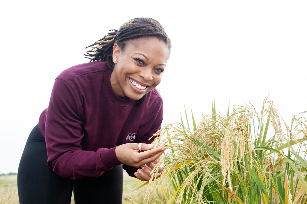 Shandrea Stallworth in a field.