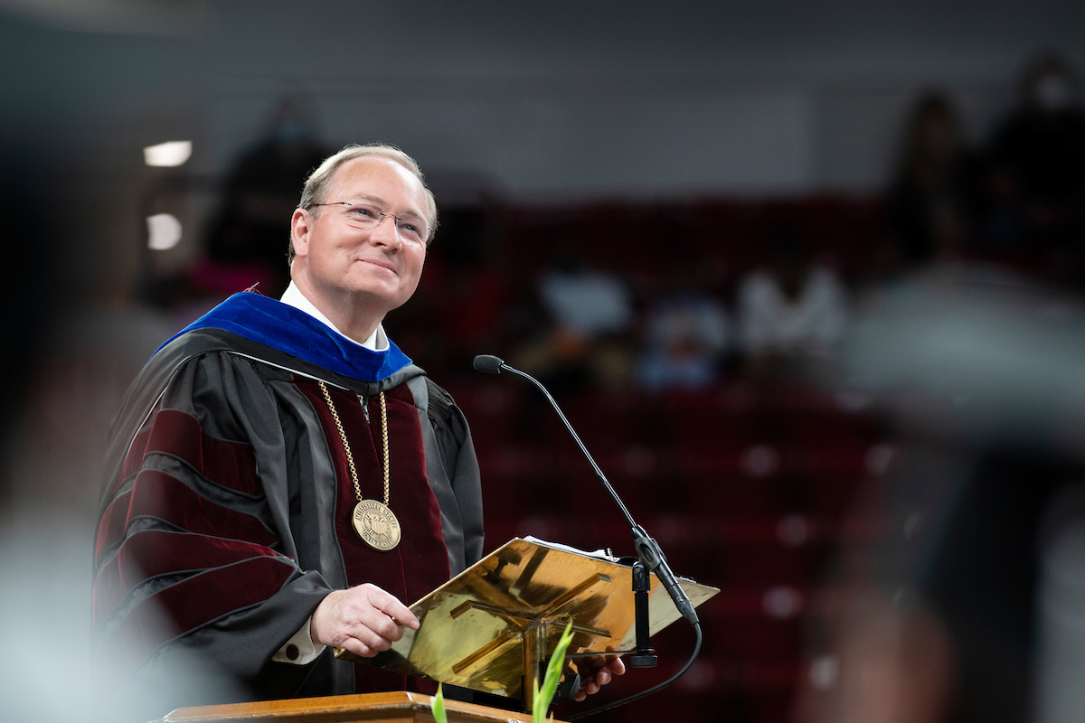 university president at graduation