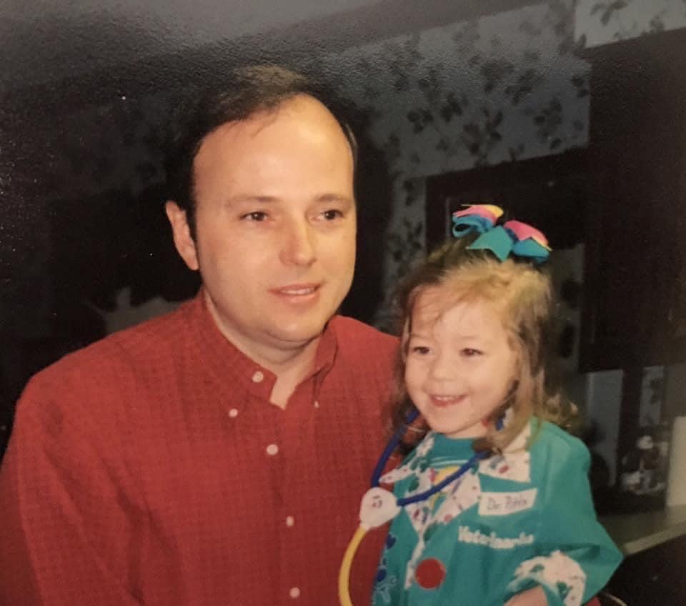 Dad with 3-year-old daughter with a stethescope