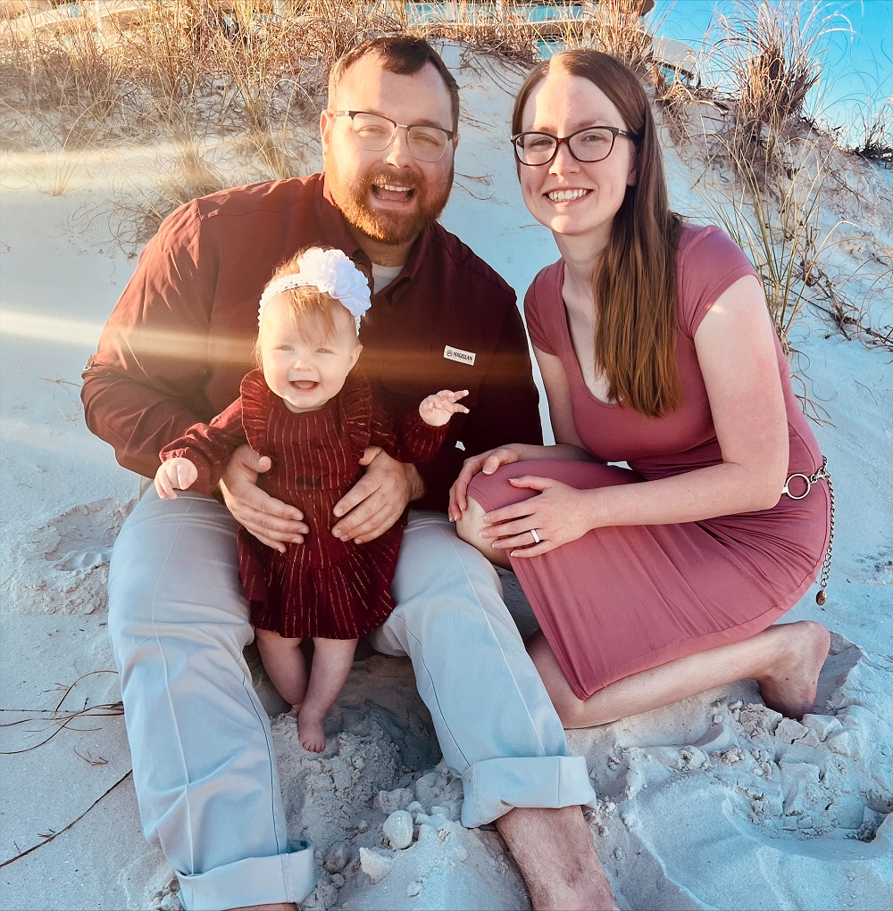 Parents with baby on a beach