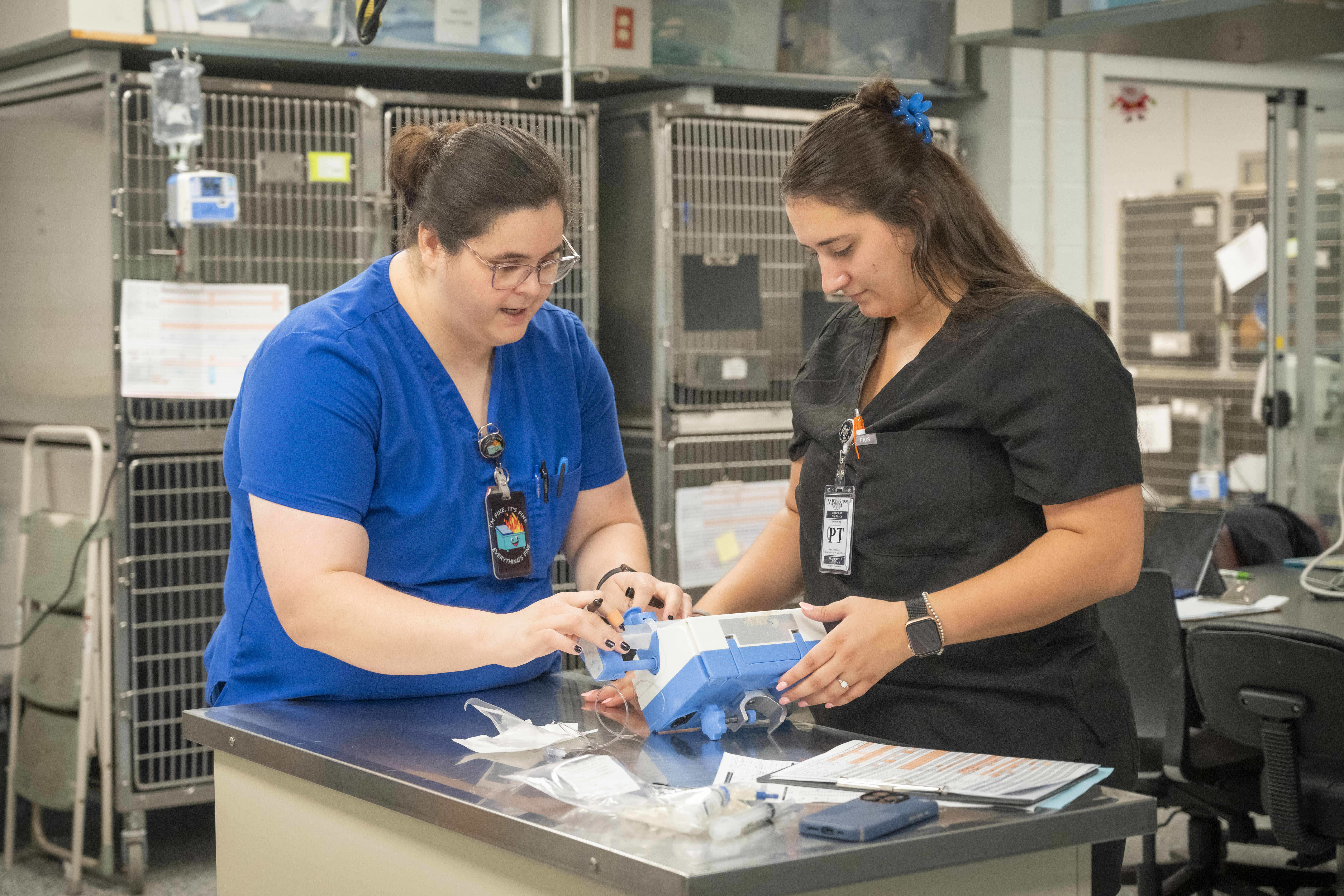 Veterinary Medicine ICU Technician with equipment