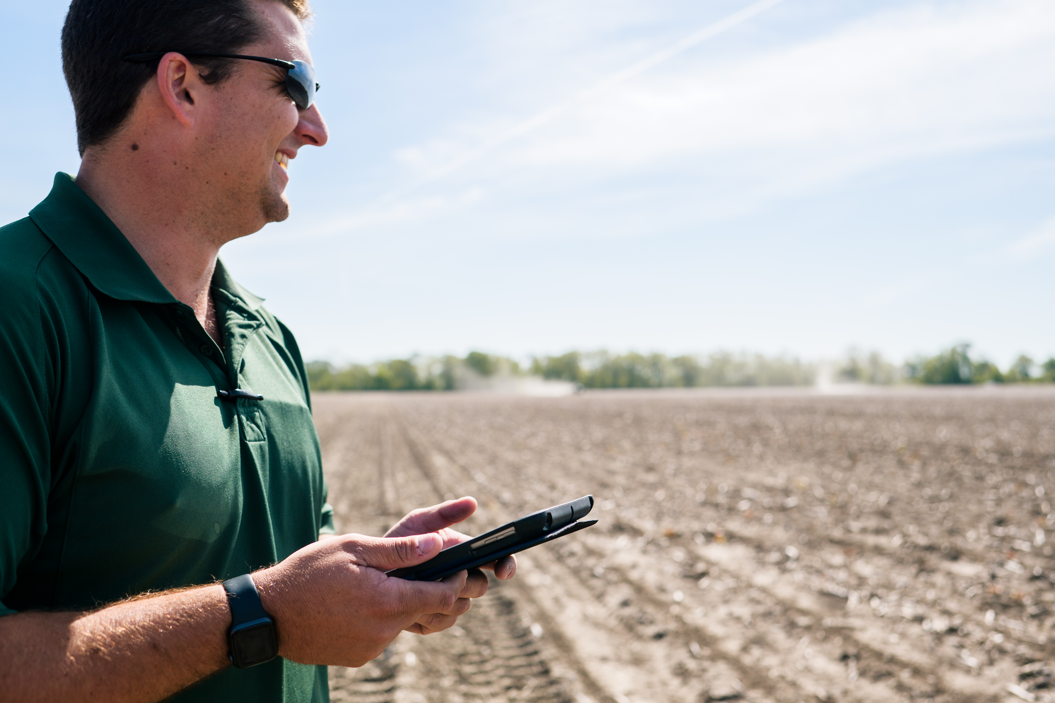 Cade Moody test equipment in a row crop field